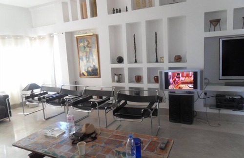 Eastern Hammamet Apartamento | A 200 metros de la playa, apartamento de arquitecto con azotea y vistas al mar.