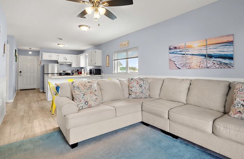 Caine Woods Casa | 2BR Family Friendly Condo w/Large Balcony, Partial Ocean Views, Outdoor Pool