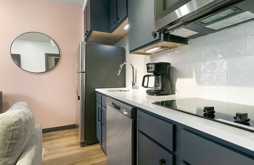 Central Business District Hotel | 2BR Haven Condo Steps to Mississippi River