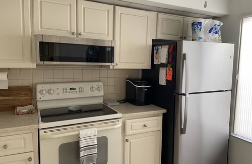 Isla del Sol Condominio | 2nd floor condo overlooking pool with a beautiful bay view.
