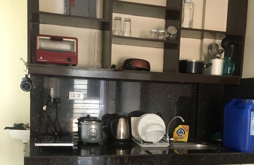 Concepcion Apartamento | Edificio de dos pisos Condotel con 2 habitaciones, cocina, terraza y estacionamiento
