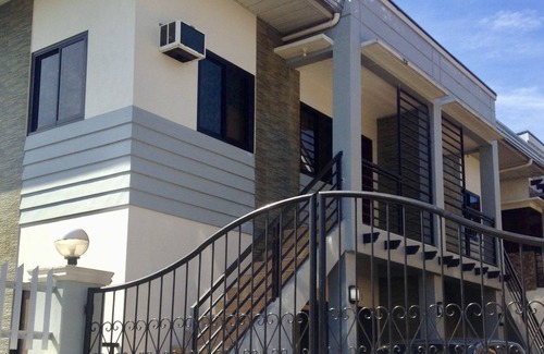 Concepcion Apartamento | Edificio de dos pisos Condotel con 2 habitaciones, cocina, terraza y estacionamiento