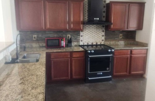 Canyon Trails Casa | 3-bedroom house backyard oasis Pool, dogs ok, free WiFi in Goodyear