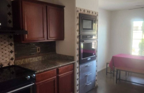 Canyon Trails Casa | 3-bedroom house backyard oasis Pool, dogs ok, free WiFi in Goodyear