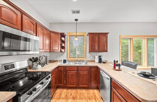 Longfellow Casa | 3-bedroom townhome with king beds two car attached garage two pull out couches