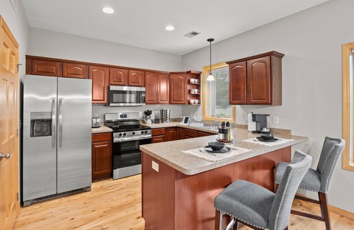 Longfellow Casa | 3-bedroom townhome with king beds two car attached garage two pull out couches