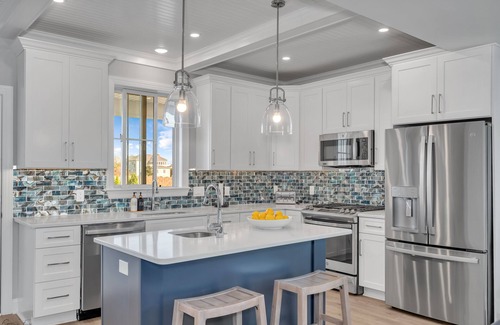 Admiral Estates Casa | 3 levels with 5 bedrooms, 4.5 baths, elevator, heated pool, and lots of gathering spaces both inside and out!