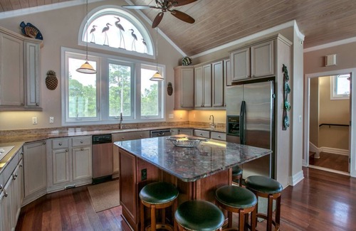 Panacea Casa | 3-Story Oceanfront Brick Home on St. Teresa Beach | 2 outdoor showers, 2 kitchen
