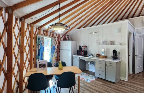 Mill Spring Casa | 30' ADA Yurt with a large deck, on the creek, full kitchen, dome skylight, dog friendly, 2 bedrooms, sleeps 5.