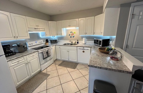 North Carolina Coast Cabaña | 30 Sec. to Beach, Sun, Sand & Waves & a Family & Pet Friendly Fenced Backyard