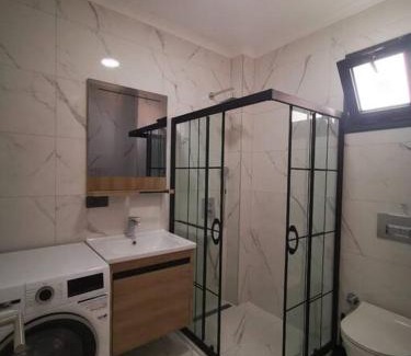 Turgutreis Apartamento | 300m to Beach 2 Bedroom Garden Floor Flat with Pool B1 - Yeni Dünya Bodrum