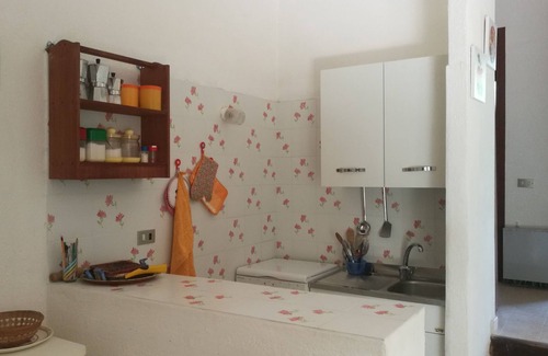 Villaggio Mandorli Casa | 350 mt from Campus, small bungalow with outdoor space surrounded by greenery.