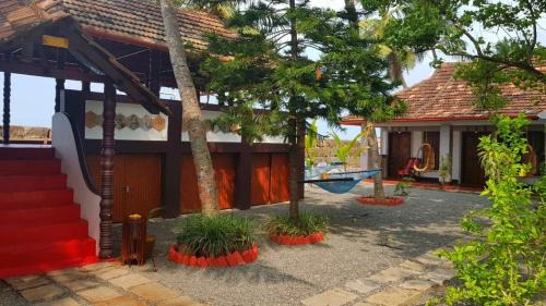 Kuzhuppilly Cama Y Desayuno | 36 Palms Heritage Villa