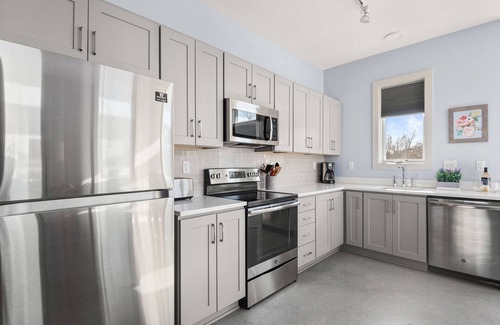 South Nashville Condominio | 10 minutos de Broadway, condominio nuevo, terraza en el techo, escena de comida internacional, ideal para grupos