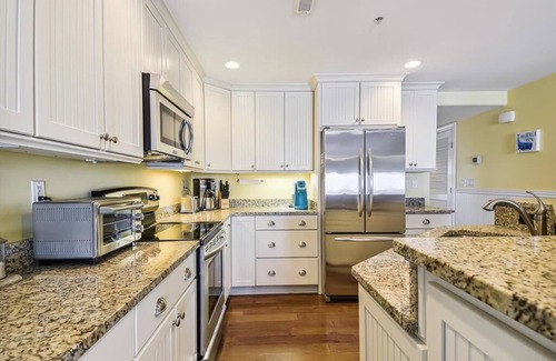 Bethany Beach Condominio | Condominio FRENTE AL MAR 3BR / 3BA en el paseo marítimo de Bethany con una PISCINA
