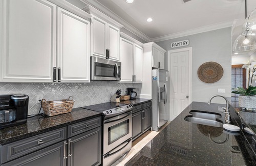 Villa Lago Casa | 3BR Beach Villa with 2- GOLF CARTS! Steps from Pool! Near Wharf. Beach Tram.