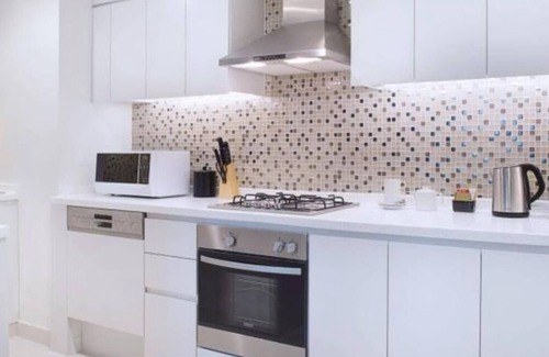 Downtown Dubai Apartamento | A 3 km del centro comercial Dubai y Burj Khalifa. Apartamento de lujo ideal para una estancia familiar.