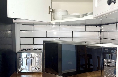 Grand Boulevard Apartamento | 4-bedroom apartment in marvelous Chicago with Workout Mirror, AC