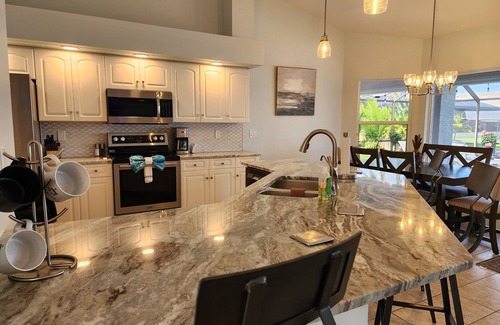 Burnt Store Casa | 4-bedroom Gulf access, heated pool, lanai, dock
