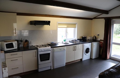 Tirabad Casa | 4 Bedroom Holiday Lodge in Welsh Hillside Woodland
