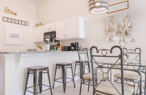 Lake Berkley Villa | 4 Bedroom Home with Tranquil Lakeview Pool/Spa & Game Room (close to Disney!)