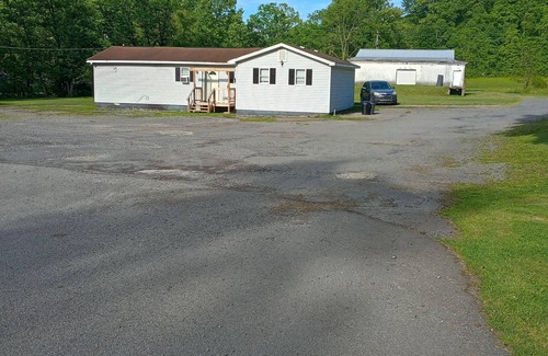 Minden Casa | 4 bedroom house sleeps 13 with huge backyard right before Ace Adventure resort