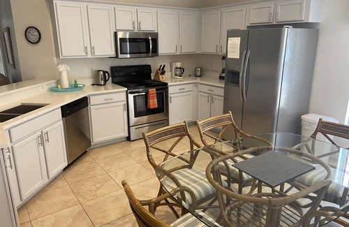 Kissimmee Casa | Casa con piscina de 4 dormitorios con vista de conservación en la comunidad cerrada de golf de Remington