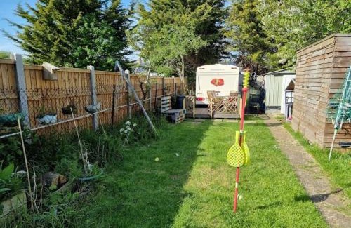 Gravesend Otro | 4 berth caravan in a garden, nestled in the trees