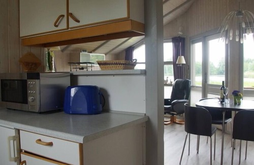 Norderteil Casa | 4 person vacation home with sauna and wonderful view of the lake in Otterndorf