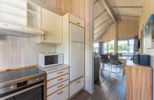 Norderteil Casa | 4-person vacation home with wood-burning stove, canoe and wonderful lake view in Otterndorf