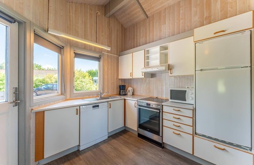 Norderteil Casa | 4-person vacation home with wood-burning stove, canoe and wonderful lake view in Otterndorf