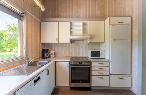 Norderteil Casa | 4-person vacation home with wood-burning stove, canoe and wonderful lake view in Otterndorf