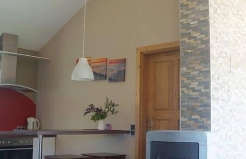Norderteil Casa | 4 person vacation home with wood-burning stove, conservatory and canoe, with a wonderful view of the lake in Otterndorf