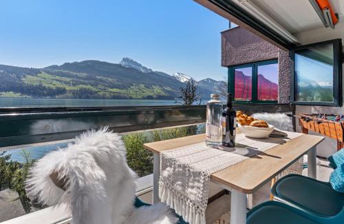Ingenbohl Apartamento | 4 Seasons Apartment I 1-4 Personen I See, Bergsicht I 65' Smart TV, Tischkicker und Badewanne I Parkplatz