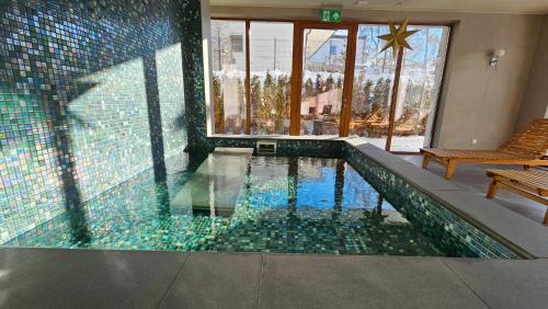 Zakopane Apartamento | 405 Apartament Zakopiański z tarasem Sauna & Jacuzzi & Siłownia & Plac Zabaw
