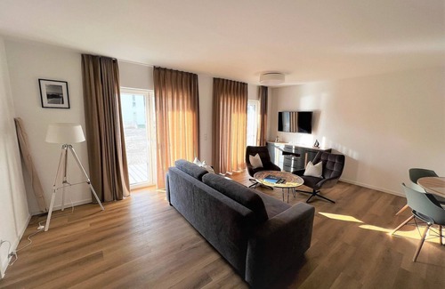 Schillig Apartamento | 49.0.M Ankerplatz - Modern, high-quality vacation apartment, first floor, sauna,