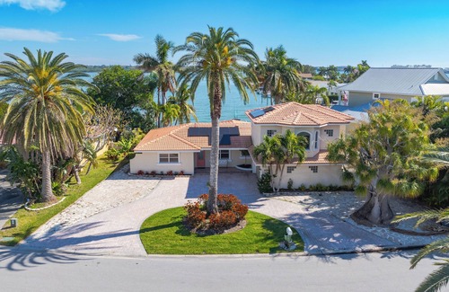 North Redington Beach Casa | 4bd 2ba Waterfront House with Pool, Hot Tub & Boat!
