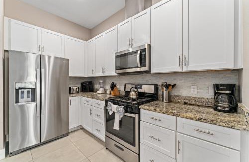 West Kissimmee Casa | 4BD All Suites Home with BBQ minutes from Disney