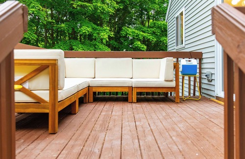 Traverse City Casa | 4bdr 2 bath house. Unwind in the hot tub, chat around the fire pit and disc golf
