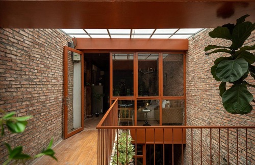 Downtown Ho Chi Minh City Casa | 4BR Industrial Gem with Rooftop Garden by Bến Thành