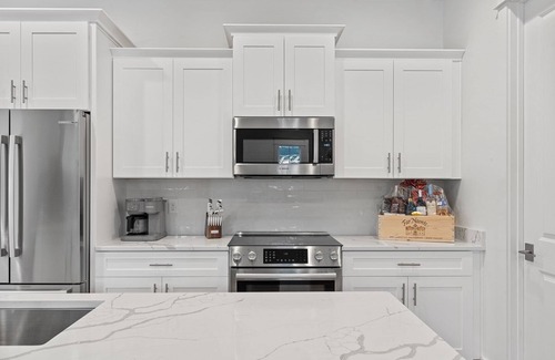 Villa Lago Casa | 4BR Villa w/ 6-Seat GOLF CART! Patio, Steps to Pool, Near Wharf, Beach Chairs