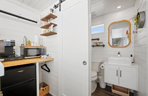 Detroit Otro | 5 acre SECLUDED tiny house village SWIMPOND! 5 mins from downtown Detroit