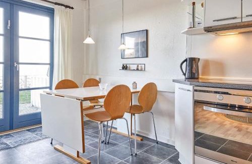 Gudhjem Casa | 5 person holiday home on a holiday park in Gudhjem