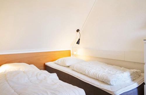 Gudhjem Casa | 5 person holiday home on a holiday park in Gudhjem