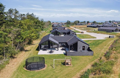 Hasmark Strand Casa | 5 esrellas case en Otterup