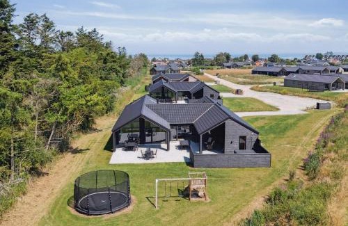 Hasmark Strand Casa | 5 star holiday home in Otterup