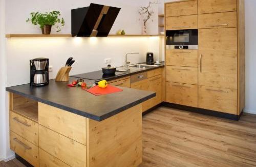 Kalzhofen Apartamento | 5 Sterne Ferienwohnung Hochgratblick mit Schwimmbad und Sauna