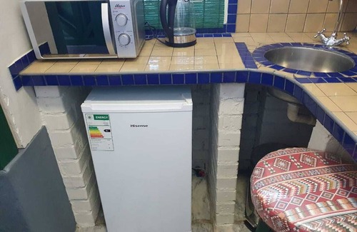 Strand Cabaña | 8 Sleeper Unit - Cabaña en una casa de huéspedes