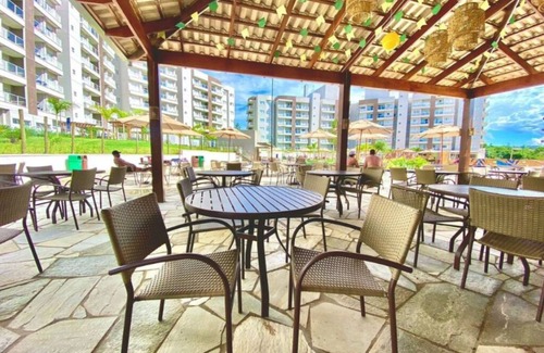 Caldas Novas Apartamento | 54 m² apartment, 2 bedrooms (1 suite), balcony, kitchenette and living room