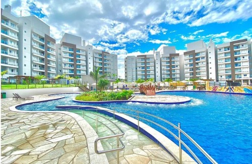 Caldas Novas Apartamento | 54 m² apartment, 2 bedrooms (1 suite), balcony, kitchenette and living room
